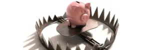 Sparschwein in einer Falle